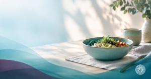 Softly lit bowl of food on a table, representing gentle, root-cause support for food sensitivity and stress